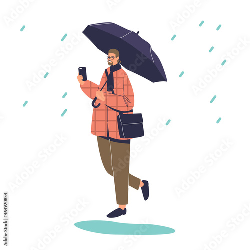 Man walking in rain holding open umbrella. Bad autumn weather and rainy day forecast