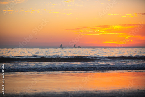 Sunset in the sea with beautiful clouds. Sunrise ocean seascape. © Volodymyr