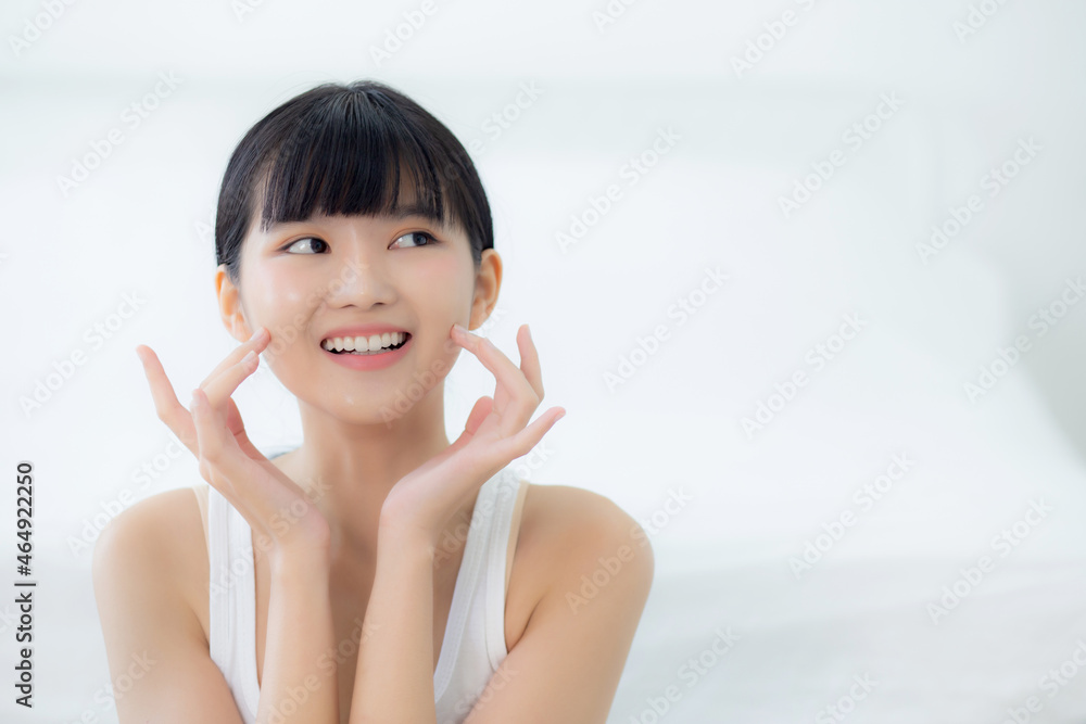 Beautiful young asian woman makeup of cosmetic, girl hand touch cheek on face and smiling attractive, facial of beauty perfect skincare with wellness and wrinkle, skin care and health concept. Beautiful young asian woman makeup of cosmetic, girl hand touch cheek on face and smiling attractive, facial of beauty perfect skincare with wellness and wrinkle, skin care and health concept.