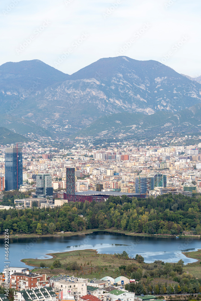 Tirana panoramic city view from hills, lake and mountain landscape