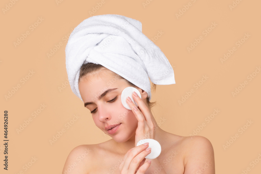 Face mask, spa beauty treatment, skincare. Woman facial care. Beautiful young woman touching cheek with sponge. Portrait of beauty model with natural nude makeup. Spa, skincare and wellness. Face mask, spa beauty treatment, skincare. Woman facial care. Beautiful young woman touching cheek with sponge. Portrait of beauty model with natural nude makeup. Spa, skincare and wellness.