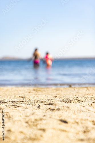 parent and child on beach