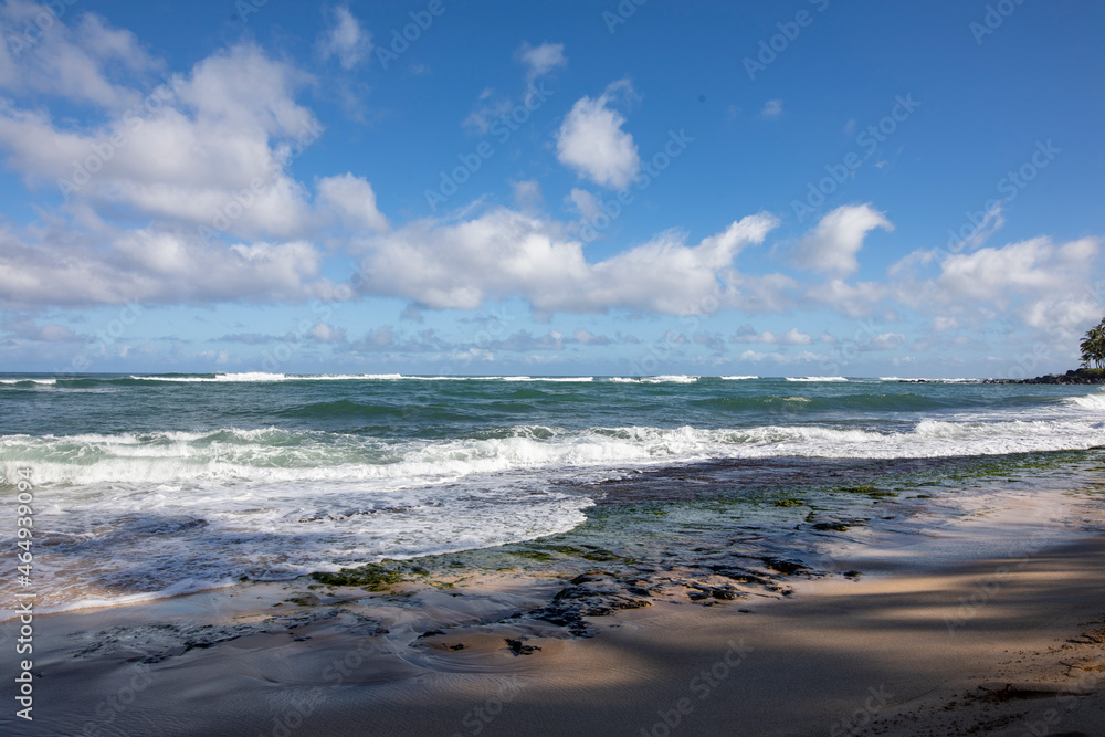 Ocean. waves and cloudy blue sky