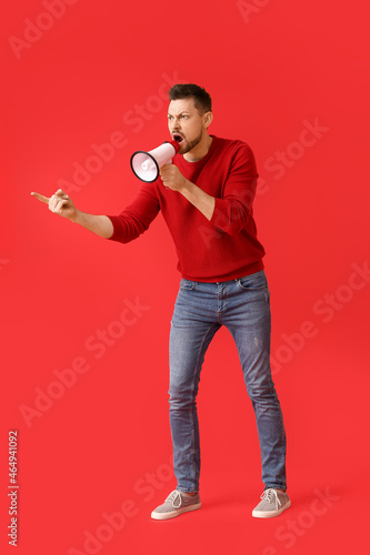 Protesting man with megapho...