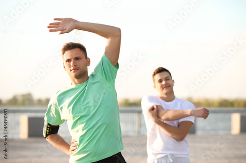 Sporty young man exercising...