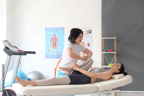Female physiotherapist work...