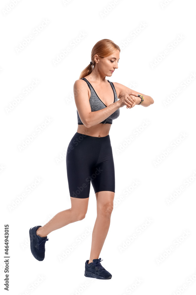Female runner checking pulse on white background Female runner checking pulse on white background