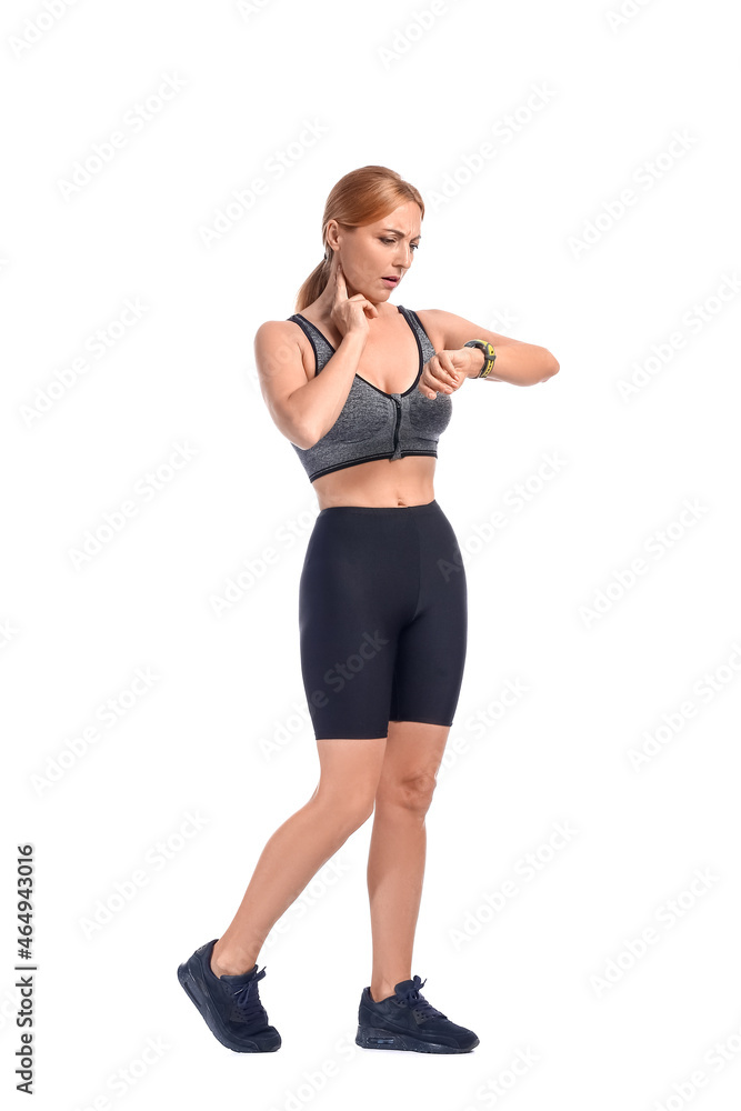 Female runner checking pulse on white background Female runner checking pulse on white background