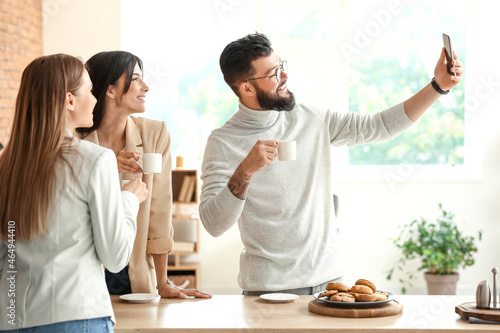 People taking selfie while ...
