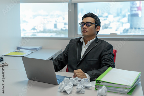 serious businessman working in the office. photo