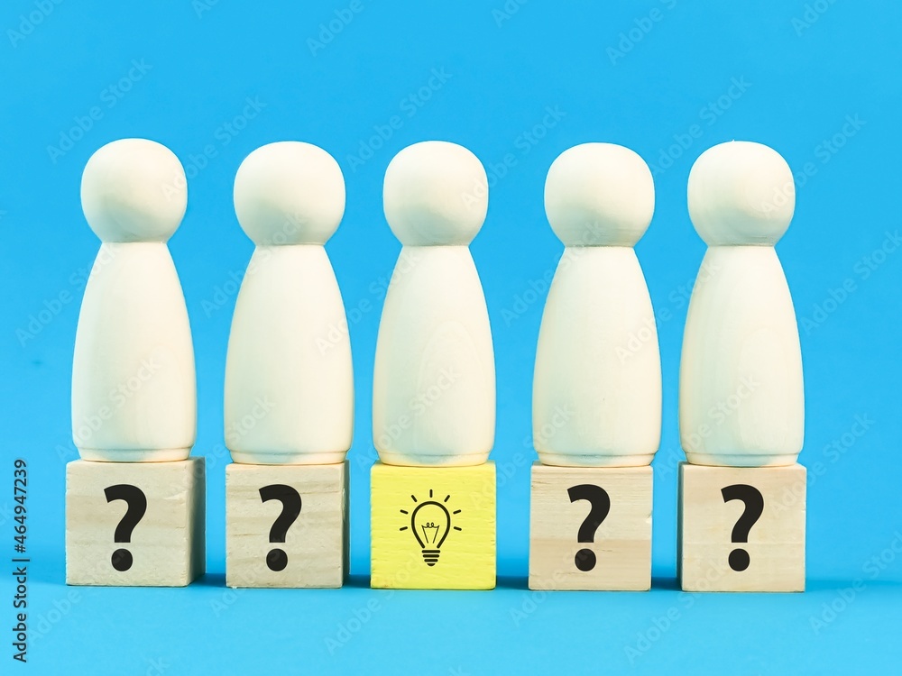 Fresh idea and option of solution concept. A row of wooden dolls and cubes. Fresh idea and option of solution concept. A row of wooden dolls and cubes.