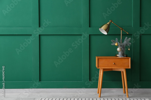 Wallpaper Mural Table with lamp and Christmas decor near color wall Torontodigital.ca