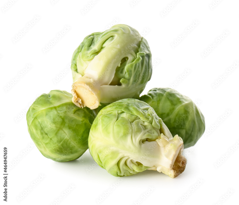 Fototapeta premium Raw Brussels sprouts on white background