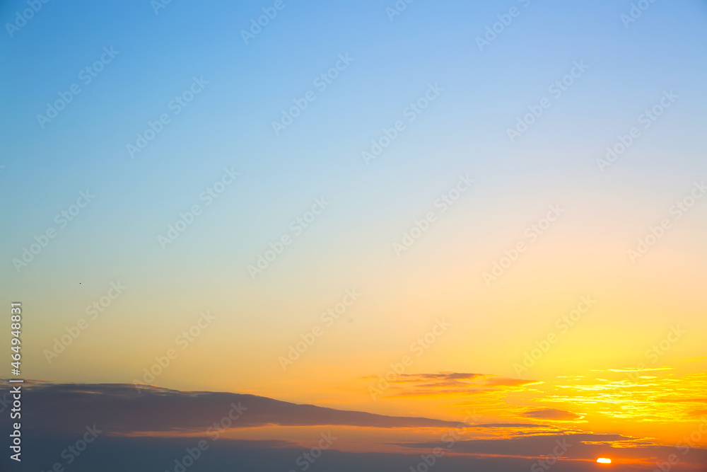 View of beautiful sky with clouds at sunrise View of beautiful sky with clouds at sunrise