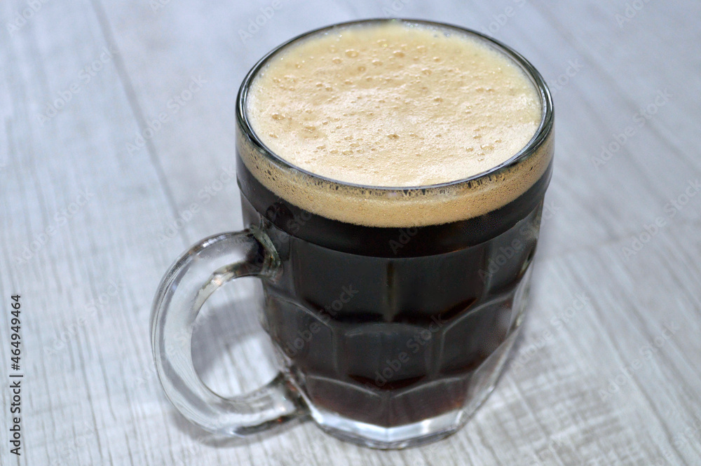 A glass of German style bock on the table A glass of German style bock on the table
