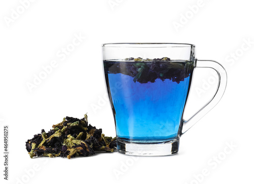 Cup of butterfly pea flower tea on white background