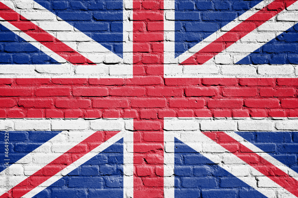 Fototapeta premium Flag of the United Kingdom painted on brick wall