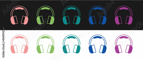 Set Headphones icon isolated on black and white background. Earphones. Concept for listening to music  service  communication and operator. Vector