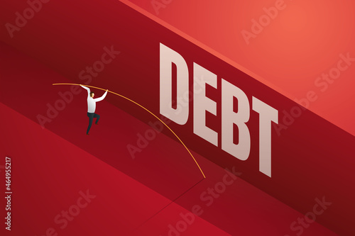 Businessman pole vault a huge debt wall.