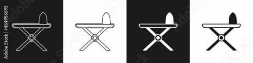Set Electric iron and ironing board icon isolated on black and white background. Steam iron. Vector