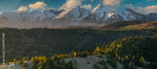 Fototapeta Naklejka Na Ścianę i Meble -  View on snow-capped mountain peaks in a beautiful, dramatic morning. Tatra Mountain, Slovakia	