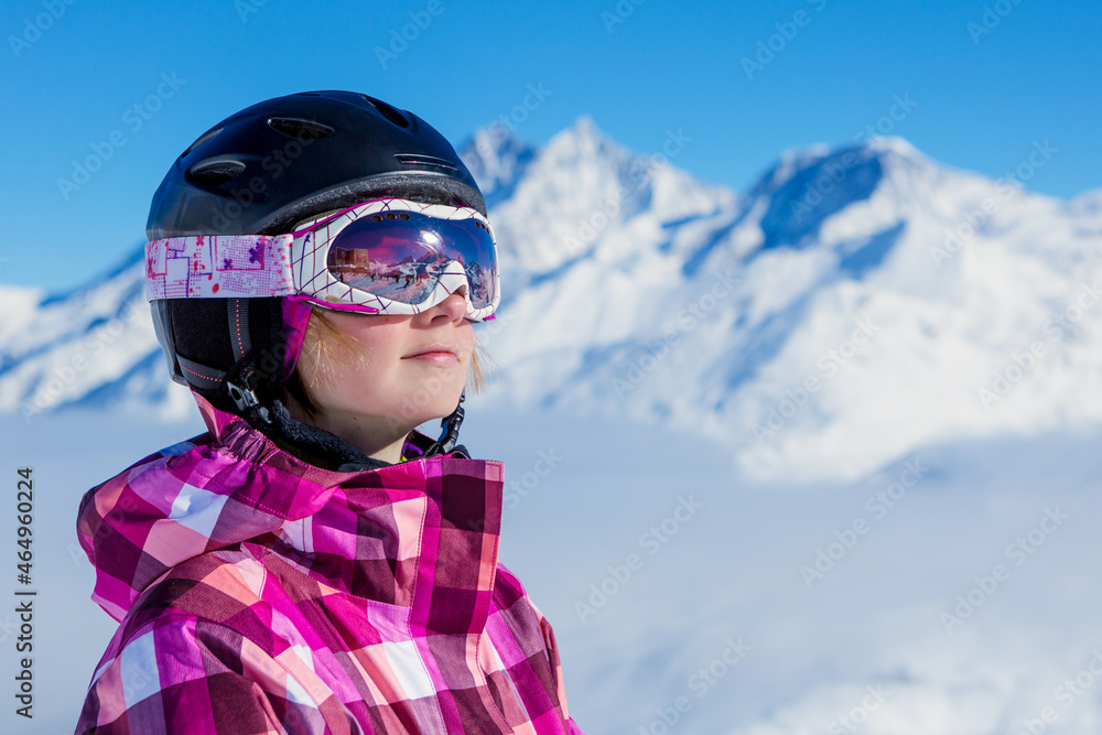 Portrait of young woman in helmet. Ski in winter time. Winter vacation in Swiss Alps. Portrait of young woman in helmet. Ski in winter time. Winter vacation in Swiss Alps.