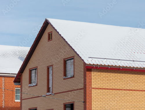 Snow on the roof of the house