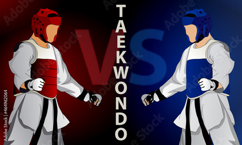 Sparring of two fighters in taekwondo. Both fighters are in protective suits, gloves, helmet. Abstract sports background.