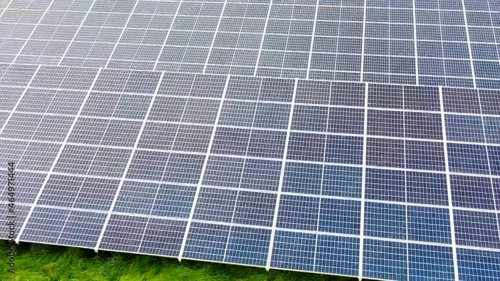 Top view of a solar farm. Rows of modern solar panels. Energy from the sun. Top view of a solar farm. Rows of modern solar panels. Energy from the sun.