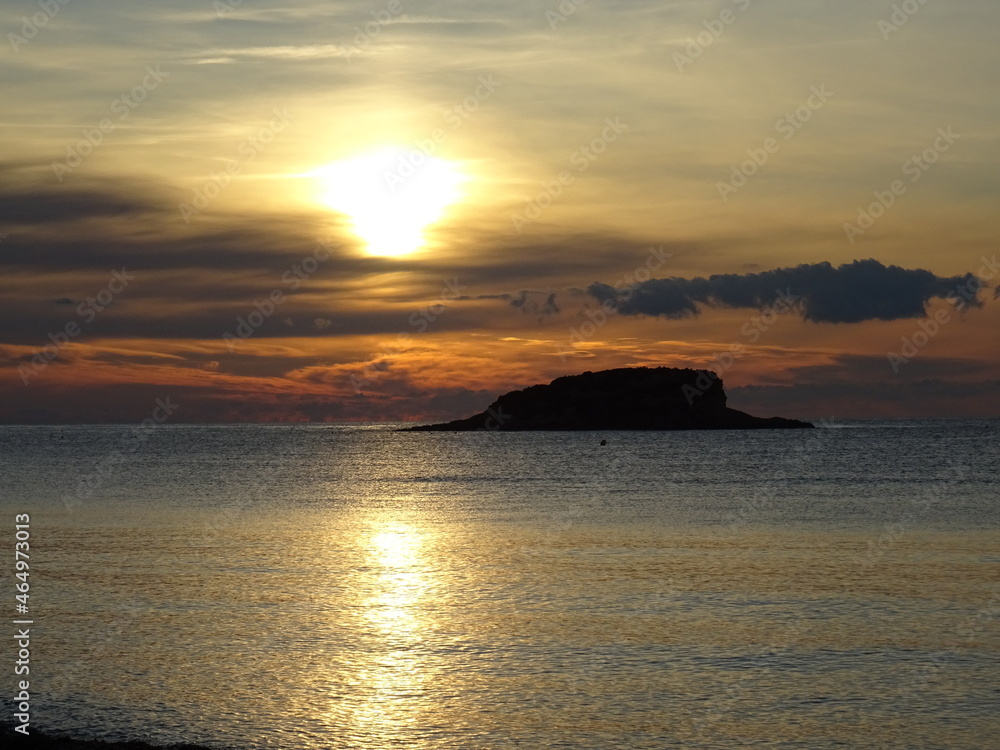 sunset over the sea. Isla de L'Olla de Altea al amanrcer