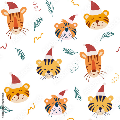 Cute Christmas tiger seamless pattern. Muzzles of tigers in Christmas hats. Perfect for kids apparel  fabric  textile  nursery decoration  wrapping paper. Vector illustration.