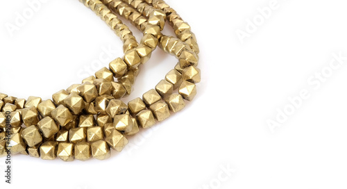 Golden necklace isolated on a white background