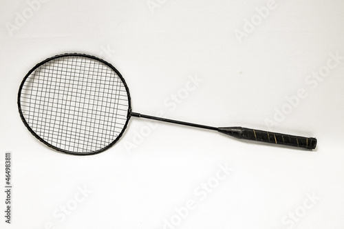 High angle closeup of a badminton racket on a white background photo