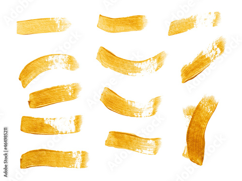 Set Of Golden Paint Strokes Isolated White