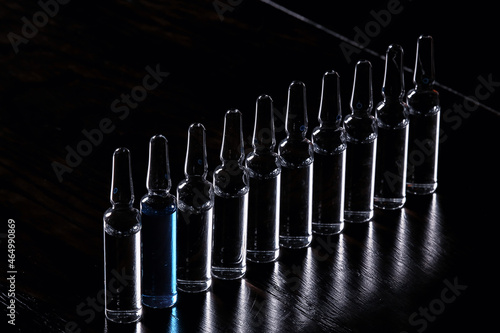ampoules medicine vaccine concept, abstract background, vaccination virus protection