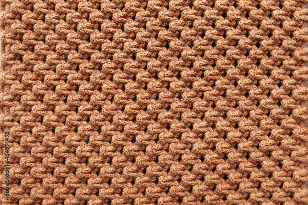 Handmade macrame pattern close up. Macrame braiding and cotton threads on wooden table. Female hobby. ECO friendly modern knitting DIY natural decoration concept in the interior. Copy space Handmade macrame pattern close up. Macrame braiding and cotton threads on wooden table. Female hobby. ECO friendly modern knitting DIY natural decoration concept in the interior. Copy space