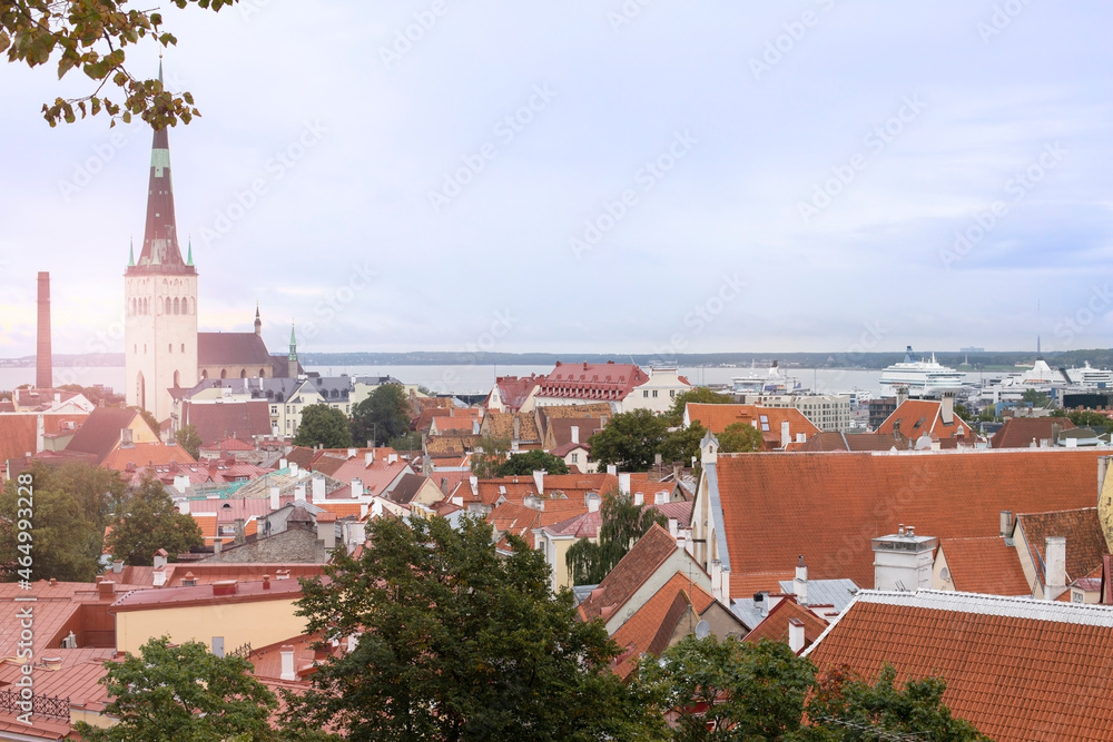 Scenic summer aerial panorama of Tallinn, Estonia with beautiful sky with clouds