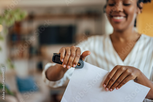 Adult woman, making sure documents are done correctly. photo