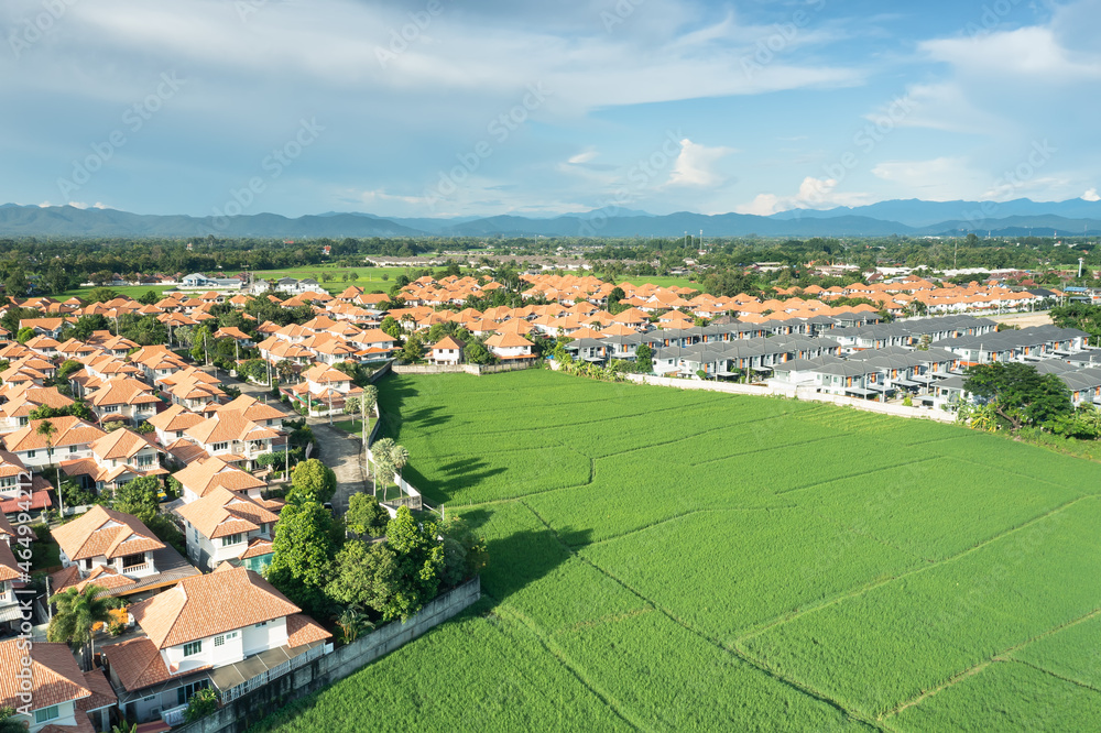 Land or landscape of green field in aerial view. Include agriculture farm, house building, village. That real estate or property. Plot of land to housing subdivision, development, sale or investment.