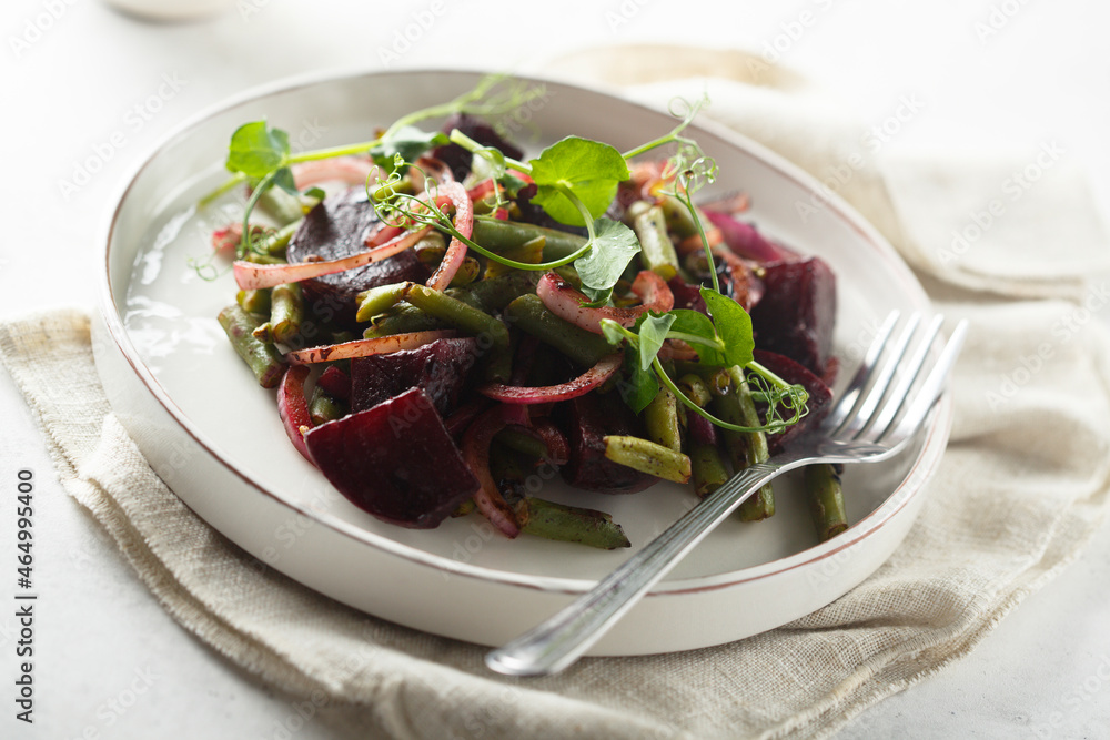 Healthy roasted beetroot salad with pickled cucumber
