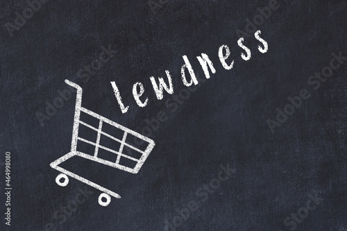 Chalk drawing of shopping cart and word lewdness on black chalboard. Concept of globalization and mass consuming photo