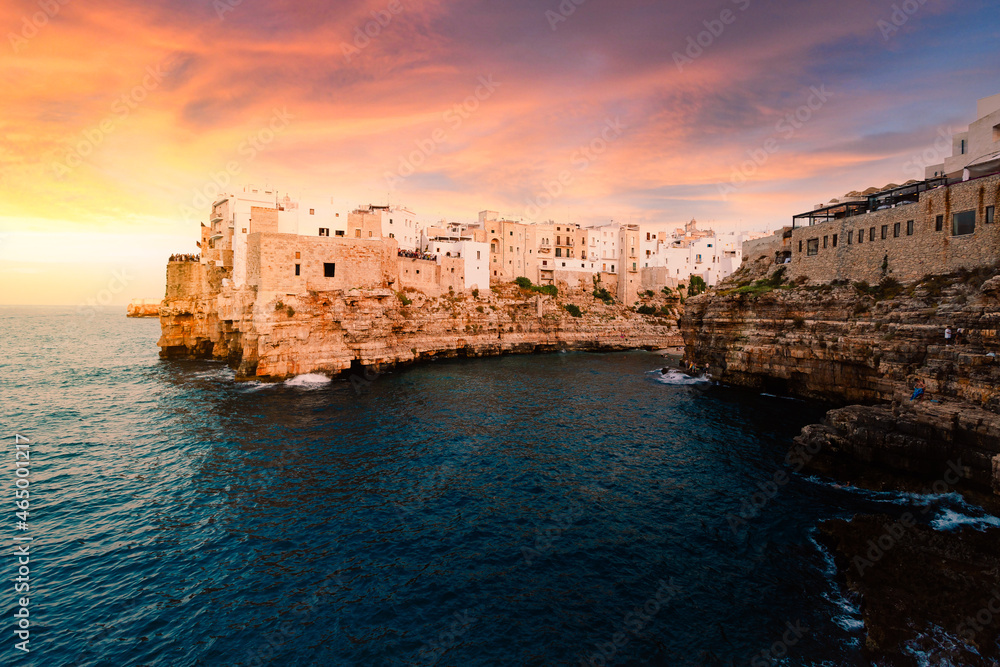 View of the village of Polignano a Mare at sunset