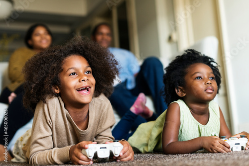 African children playing video games