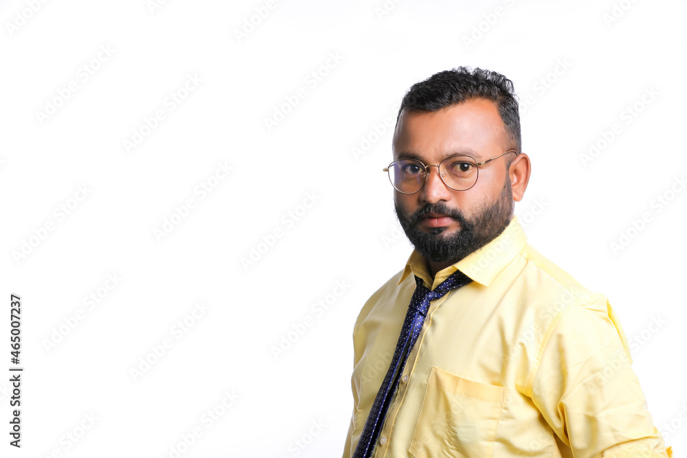 Young indian man showing expression on white background Young indian man showing expression on white background