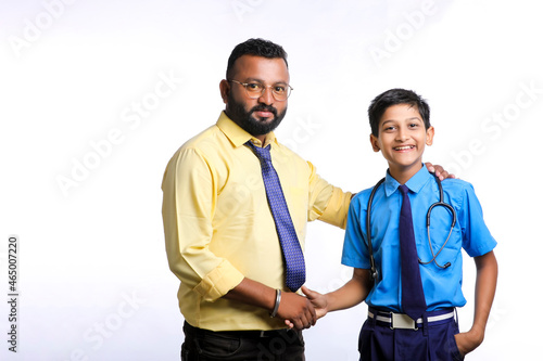 Young indian officer with school boy on white background.