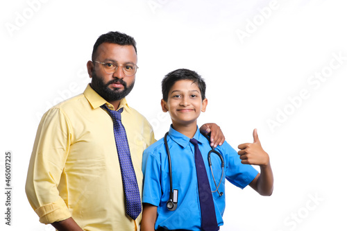 Young indian officer with school boy on white background.