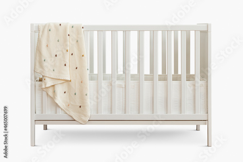 White wooden crib for baby room photo