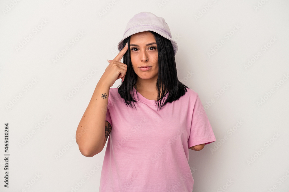 Young caucasian woman with one arm isolated on white background pointing temple with finger, thinking, focused on a task. Young caucasian woman with one arm isolated on white background pointing temple with finger, thinking, focused on a task.