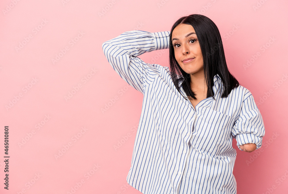 Young caucasian woman with one arm isolated on pink background touching back of head, thinking and making a choice. Young caucasian woman with one arm isolated on pink background touching back of head, thinking and making a choice.