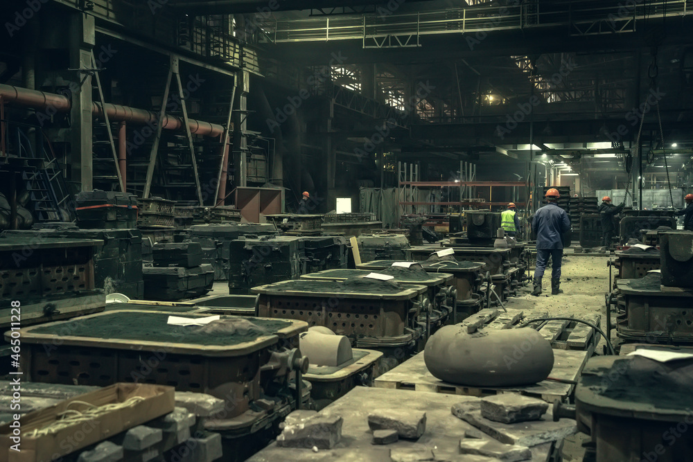 Metallurgical plant big dark workshop inside. Industrial steel production. Interior of Steel mill factory. Heavy industry foundry. Metallurgical plant big dark workshop inside. Industrial steel production. Interior of Steel mill factory. Heavy industry foundry.
